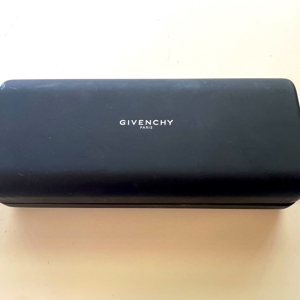 Givenchy sunglass case. Lost the frames no longer need the case.